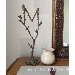 Vintage gold colored metal jewelry tree